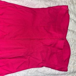 Pink strapless pencil dress with slit at
back and tags